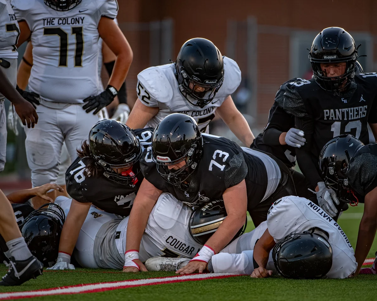 Ben Payne (#73) wrapping up the ball carrier during a game against The Colony