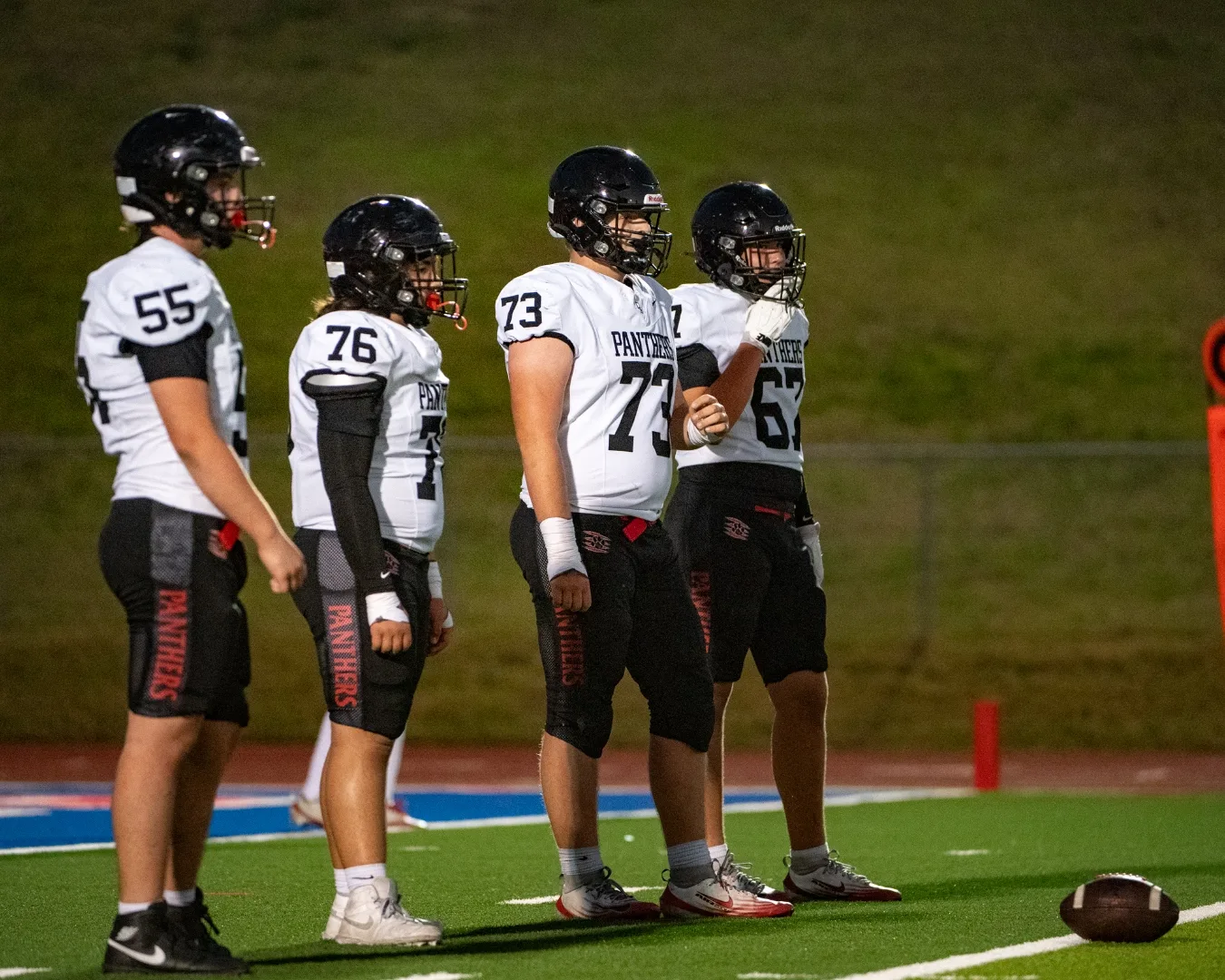 Colleyville Heritage freshman Black team lined up at scrimmage against Grapevine