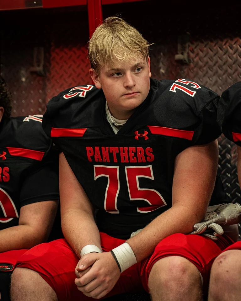 Ben Payne (#75) in the locker room before his varsity debut against Anna